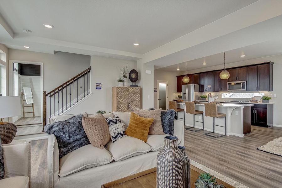 Step into the heart of your home: the great room, where comfort meets connection in perfect harmony. Designed with an open-plan concept, this expansive space invites you to gather and create lasting memories with loved ones.