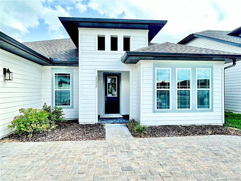Exterior details and patio area of a home in Northlake Traditional, Winter Garden (Image 1). Exterior details and patio area of a home in Northlake Traditional, Winter Garden (Image 1).