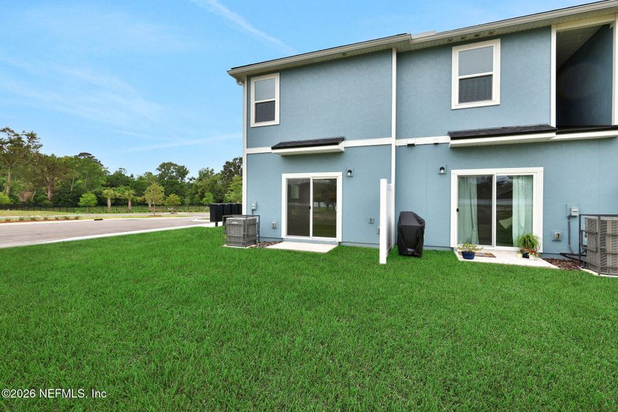 Exterior details and patio area of a home in Kasen Oaks, Jacksonville (Image 3).