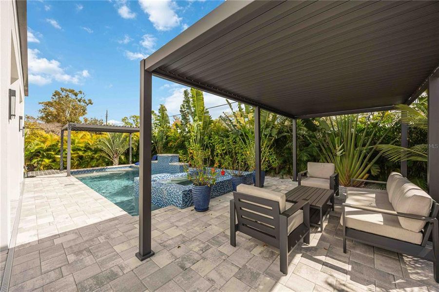 Exterior details and patio area of a home in , Sarasota (Image 23).