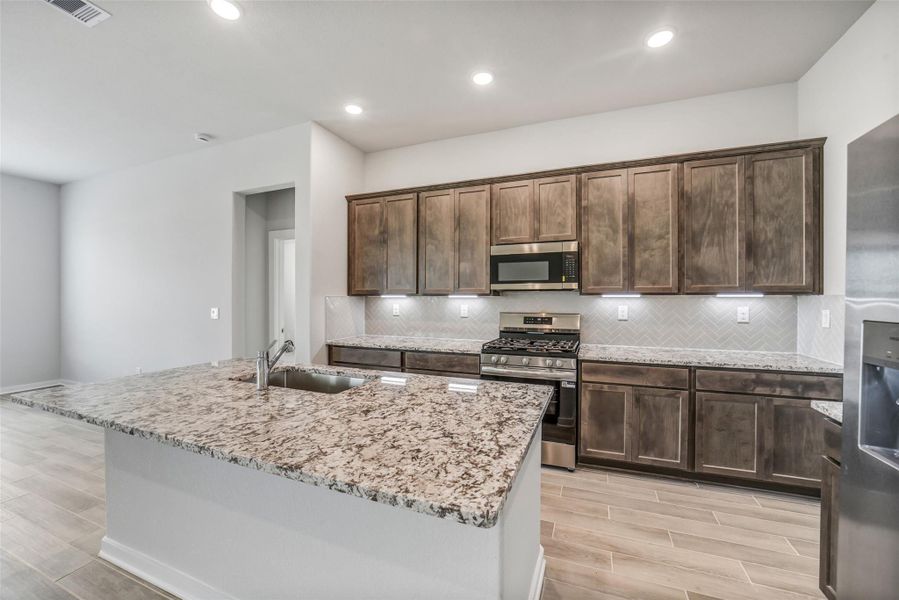 Furnished interior view inside a new home in Windmill Estates, Magnolia (Image 12).