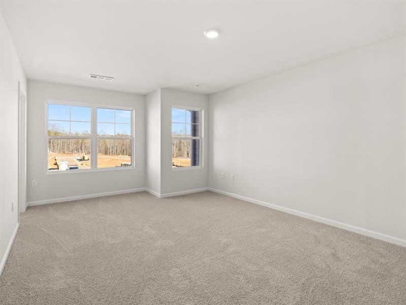 Spacious, unfurnished interior of a new home in Waypoint, Flowery Branch (Image 12).