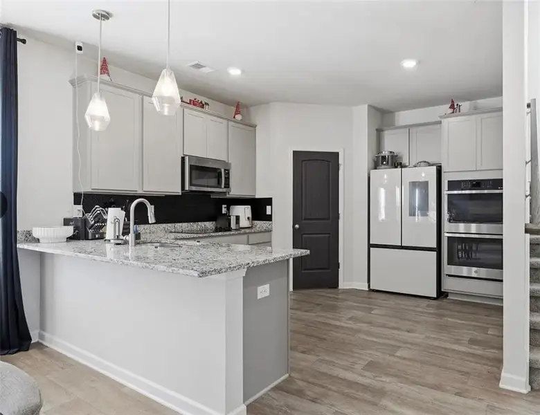 Furnished interior view inside a new home in , Covington (Image 5).