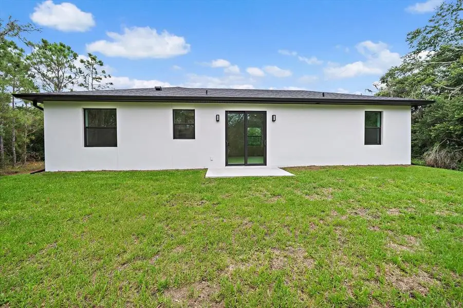 Exterior details and patio area of a home in , North Port (Image 3).