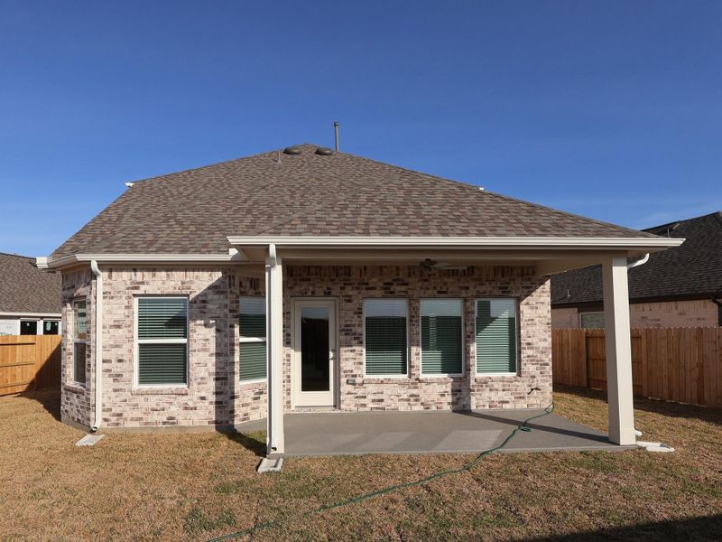 Exterior details and patio area of a home in Marvida, Cypress (Image 22).