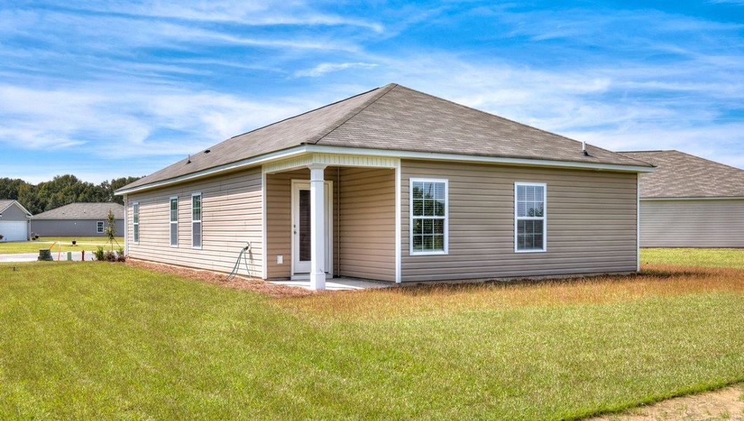 Front exterior of a new home in Lockwood Landing, Supply, NC, highlighting curb appeal (Image 2). Front exterior of a new home in Lockwood Landing, Supply, NC, highlighting curb appeal (Image 2).