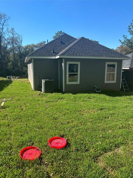 Exterior details and patio area of a home in Frontier Lakes, Willis (Image 2). Exterior details and patio area of a home in Frontier Lakes, Willis (Image 2).