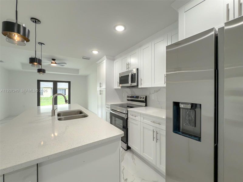 Furnished interior view inside a new home in , Lehigh Acres (Image 7).
