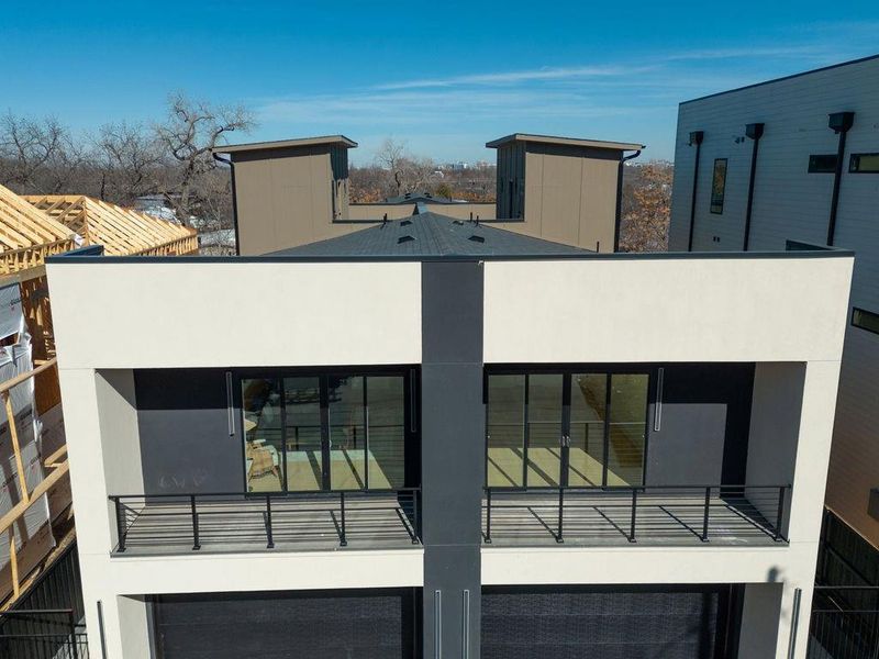 Front exterior of a new home in , Dallas, TX, highlighting curb appeal (Image 24).