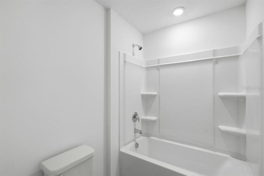 Furnished interior view inside a new home in Waterstone, Groveland (Image 31).