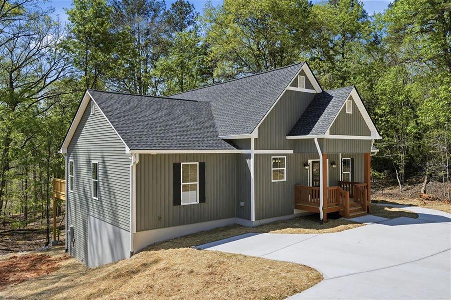 Front exterior of a new home in , Gainesville, GA, highlighting curb appeal (Image 1). Front exterior of a new home in , Gainesville, GA, highlighting curb appeal (Image 1).