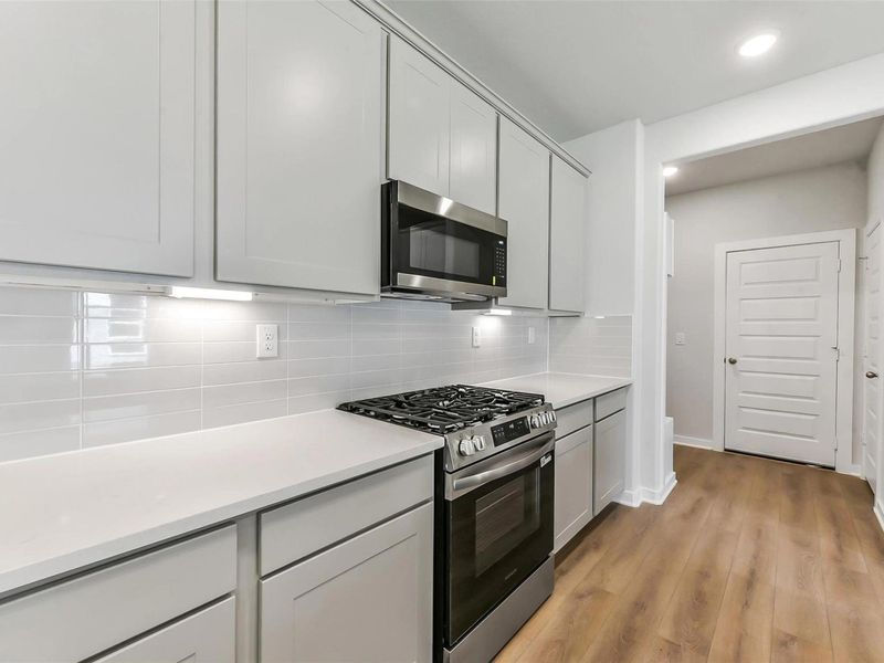 Furnished interior view inside a new home in Windmill Estates, Magnolia (Image 18).