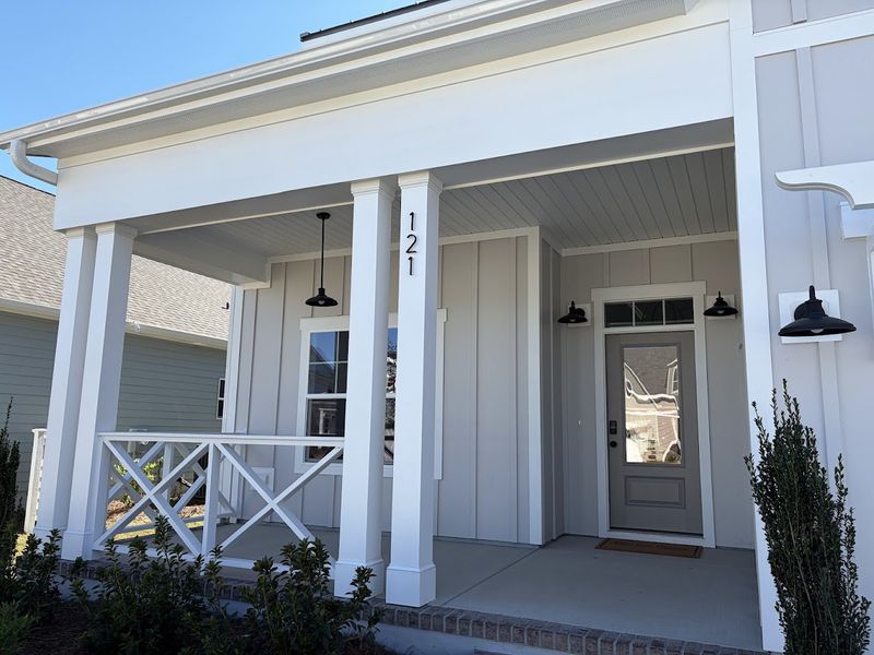 Exterior details and patio area of a home in Riverside Cove, Wilmington (Image 2).