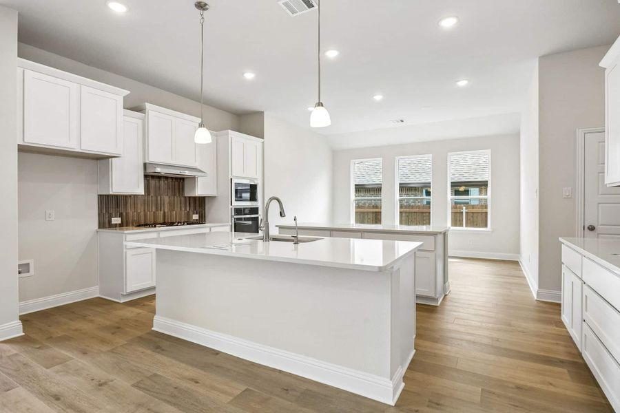 Furnished interior view inside a new home in Oaks of North Grove, Waxahachie (Image 8). Furnished interior view inside a new home in Oaks of North Grove, Waxahachie (Image 8).