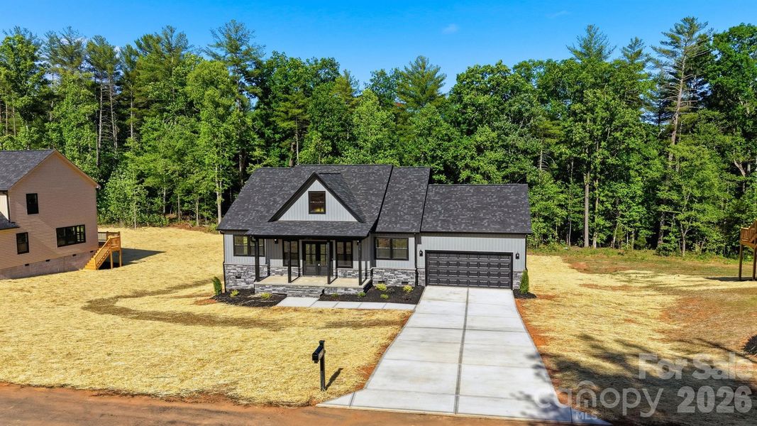 Front exterior of a new home in , Morganton, NC, highlighting curb appeal (Image 22).