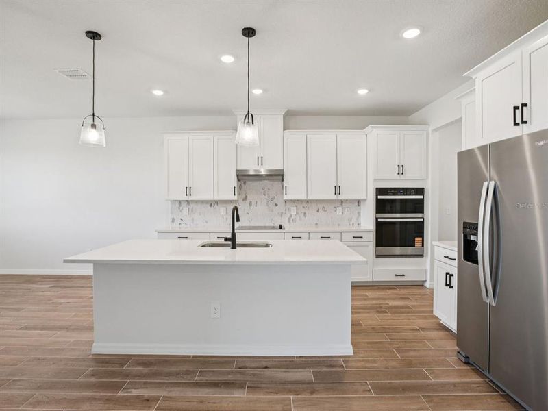 Furnished interior view inside a new home in Two Rivers - Signature Series, Zephyrhills (Image 9).