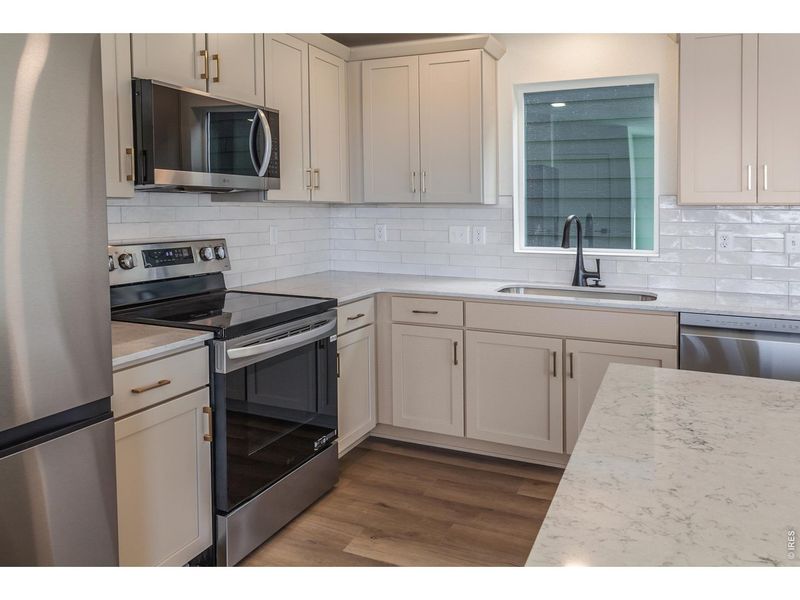 Furnished interior view inside a new home in Prairie Song Story Collection - Single Family Homes, Windsor (Image 11).