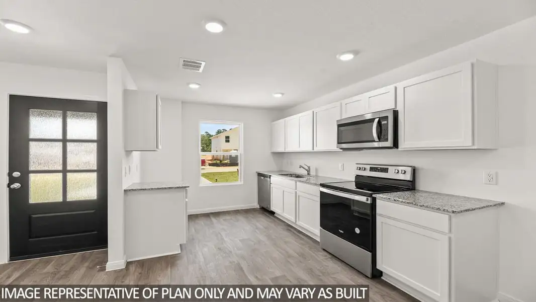 Furnished interior view inside a new home in William Trails, Willis (Image 5).