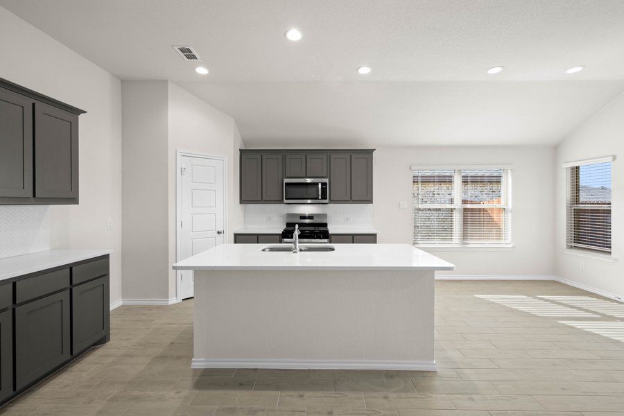 Representative exterior photo of a completed home built from the Cheyenne by Impression Homes in ValleyBrooke, Mesquite, TX (Image 5).