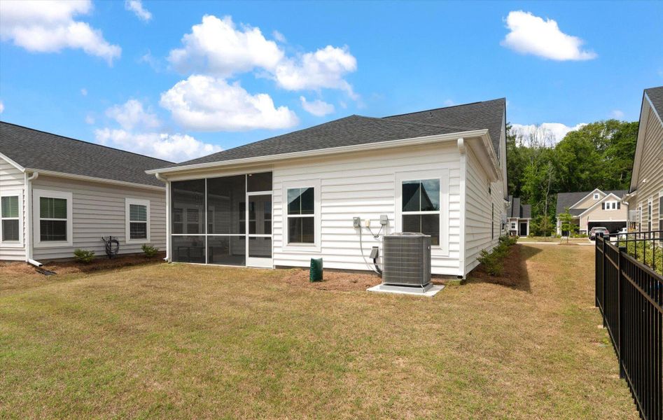 Exterior details and patio area of a home in Horizons at Summers Corner | 55+, Summerville (Image 24).