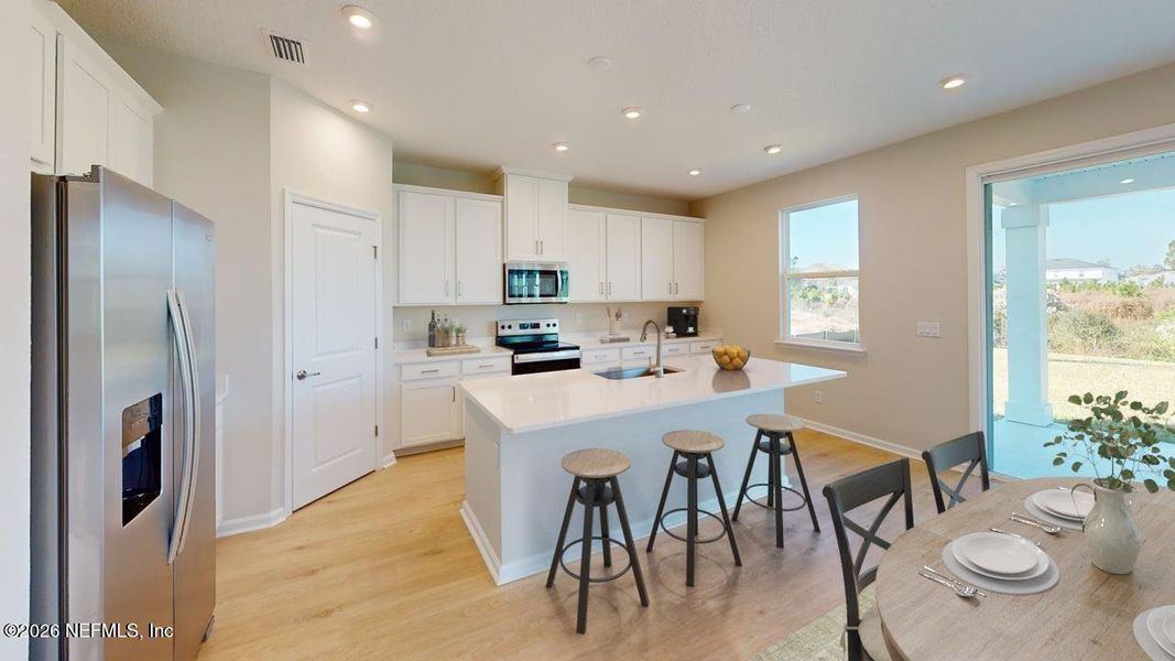 Furnished interior view inside a new home in Lakes at Bella Lago, Green Cove Springs (Image 7).