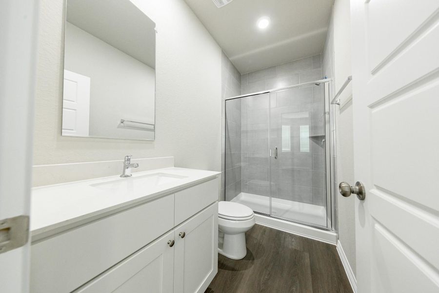 Furnished interior view inside a new home in Granger Pines, Conroe (Image 6).