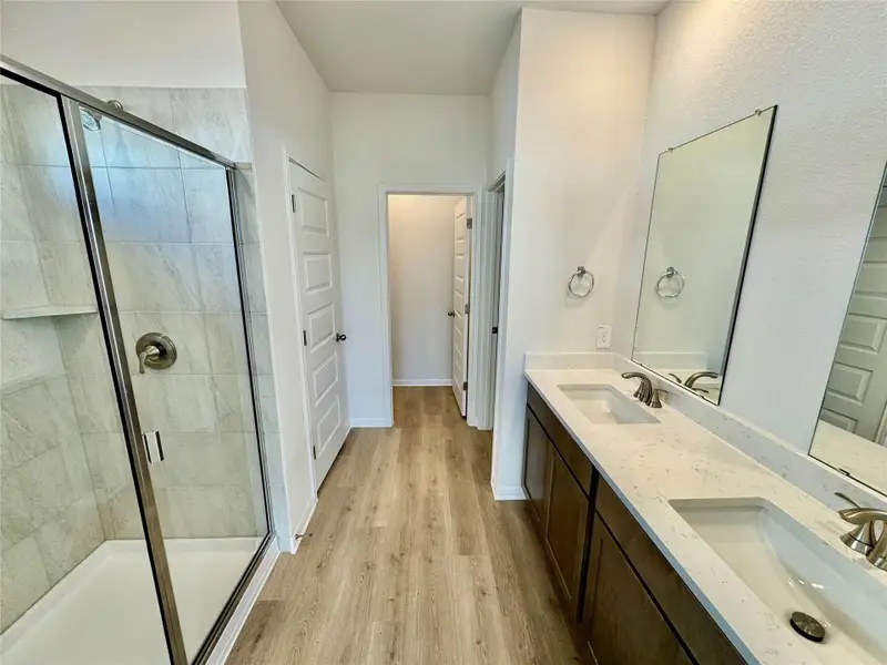 Furnished interior view inside a new home in Riverbend at Double Eagle - Boulevard Collection, Cedar Creek (Image 4). Furnished interior view inside a new home in Riverbend at Double Eagle - Boulevard Collection, Cedar Creek (Image 4).