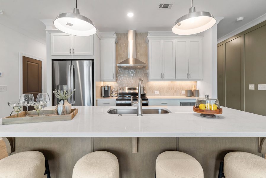 Representative furnished interior of a home built from the The Oleander by The Providence Group in Market Square at Sawnee Village, Cumming (Image 16).