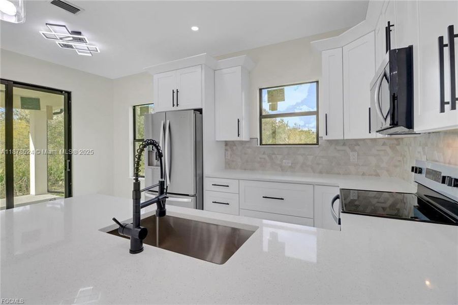 Furnished interior view inside a new home in , Lehigh Acres (Image 4). Furnished interior view inside a new home in , Lehigh Acres (Image 4).