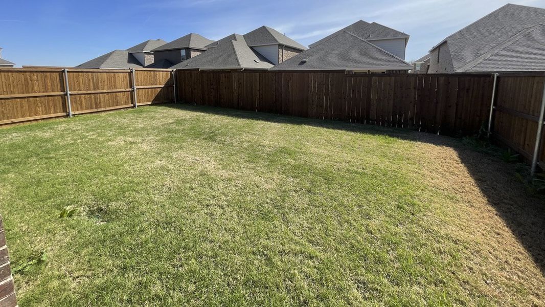 Exterior details and patio area of a home in Bel Air Village, Sherman (Image 3).