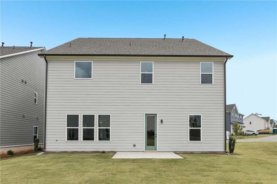 Exterior details and patio area of a home in East Harbor II at Chestatee, Dawsonville (Image 3).
