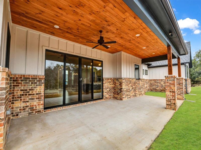 View of patio with ceiling fan