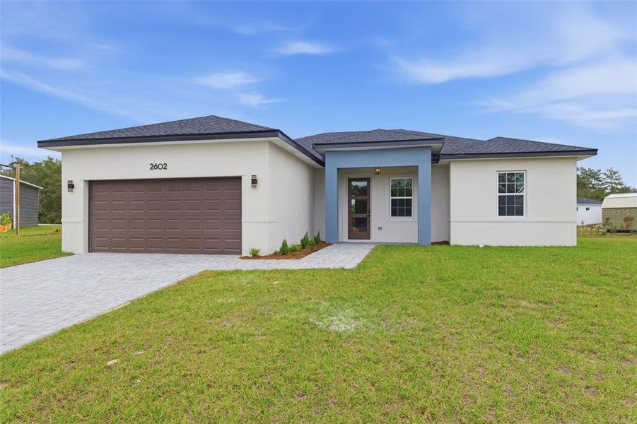 Front exterior of a new home in , Ocala, FL, highlighting curb appeal (Image 20). Front exterior of a new home in , Ocala, FL, highlighting curb appeal (Image 20).