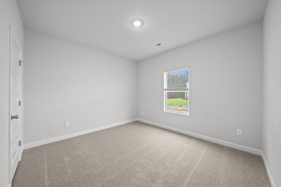 Spacious, unfurnished interior of a new home in The Farm at Wells Creek - Signature Collection, Gray Court (Image 12).