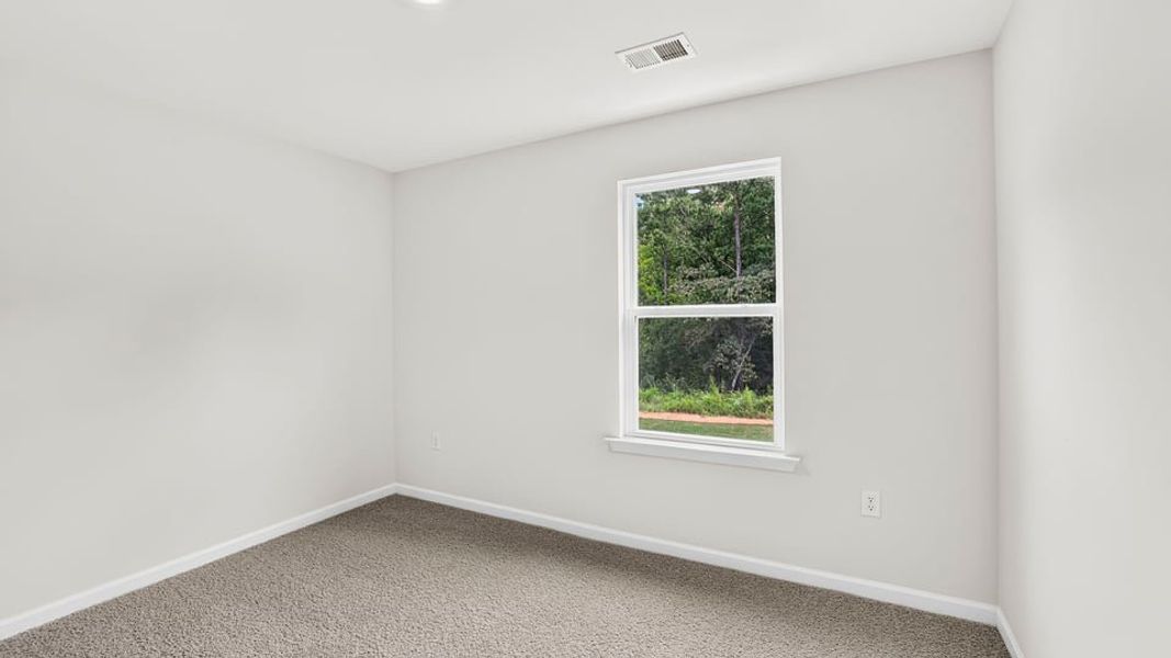 Spacious, unfurnished interior of a new home in Ravencrest, Roebuck (Image 30).