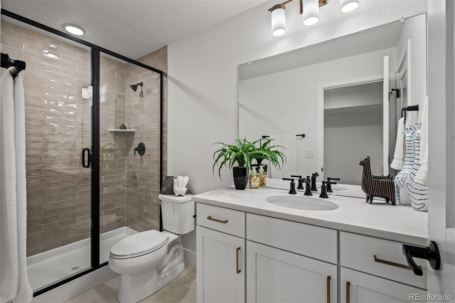 Furnished interior view inside a new home in Wolf Ranch - Enclave Collection, Colorado Springs (Image 25).