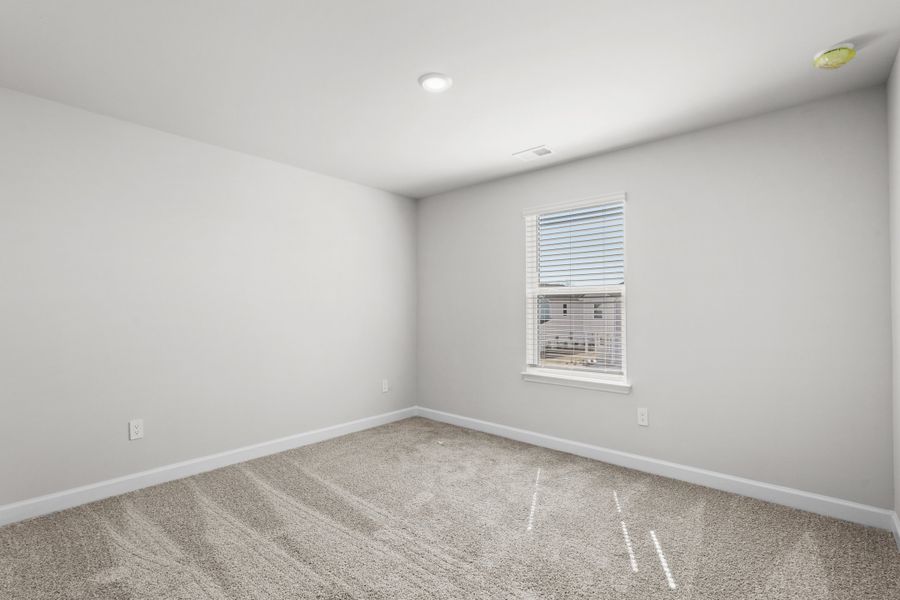 Spacious, unfurnished interior of a new home in Waterside - Coastline Series, Longs (Image 25).