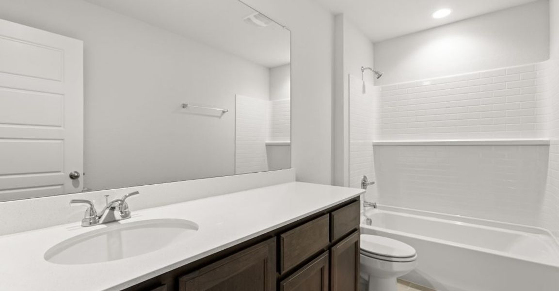 Representative exterior photo of a completed home built from the Hampton II by Impression Homes in Stone Eagle, Azle, TX (Image 21). Representative exterior photo of a completed home built from the Hampton II by Impression Homes in Stone Eagle, Azle, TX (Image 21).