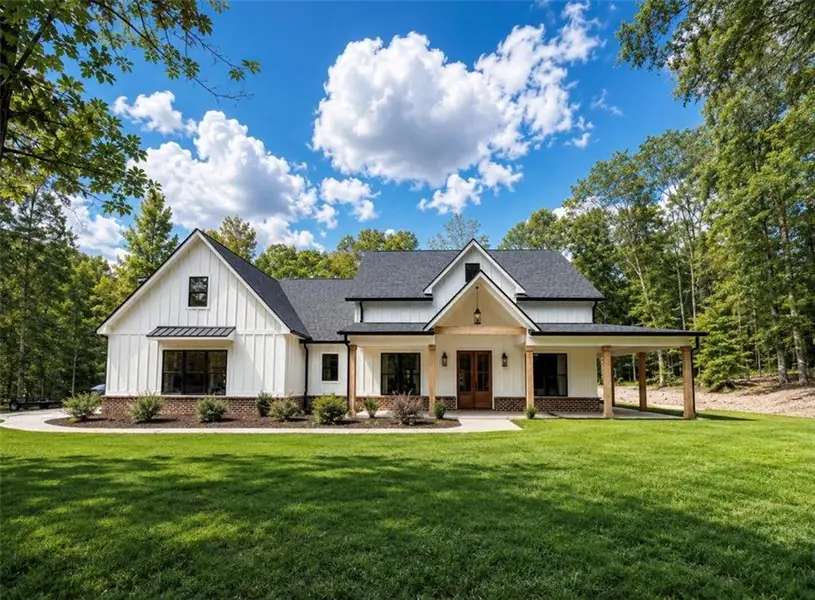 Front exterior of a new home in , Kingston, GA, highlighting curb appeal (Image 2). Front exterior of a new home in , Kingston, GA, highlighting curb appeal (Image 2).