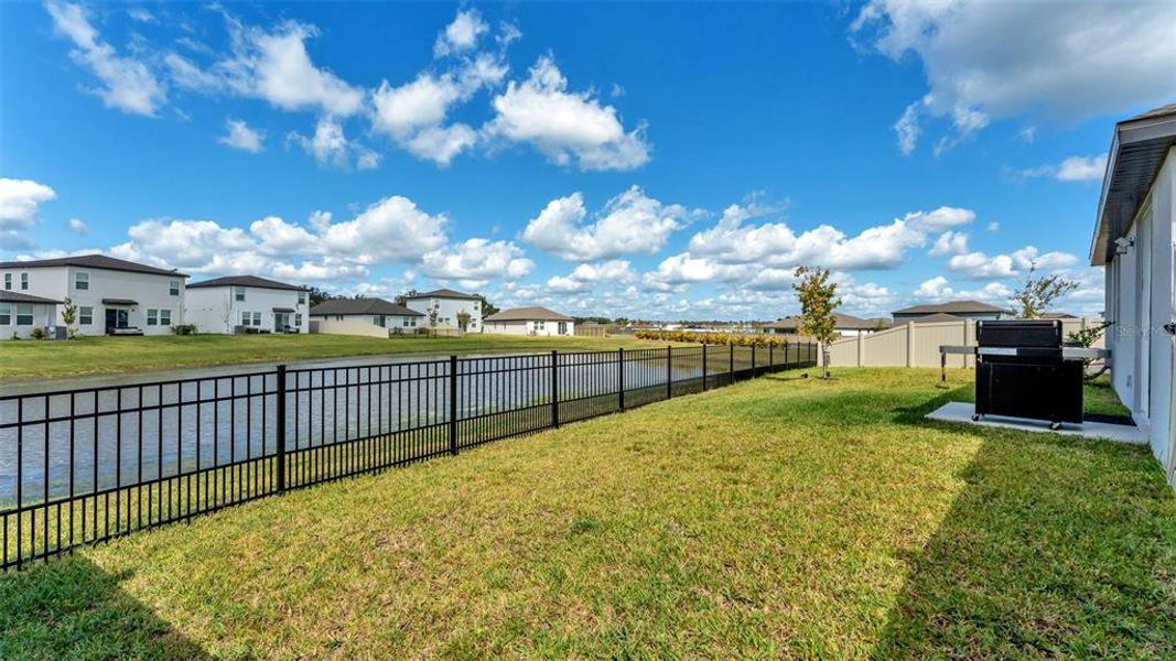 Exterior details and patio area of a home in The Grove at Stuart Crossing - Premier Series, Bartow (Image 24).