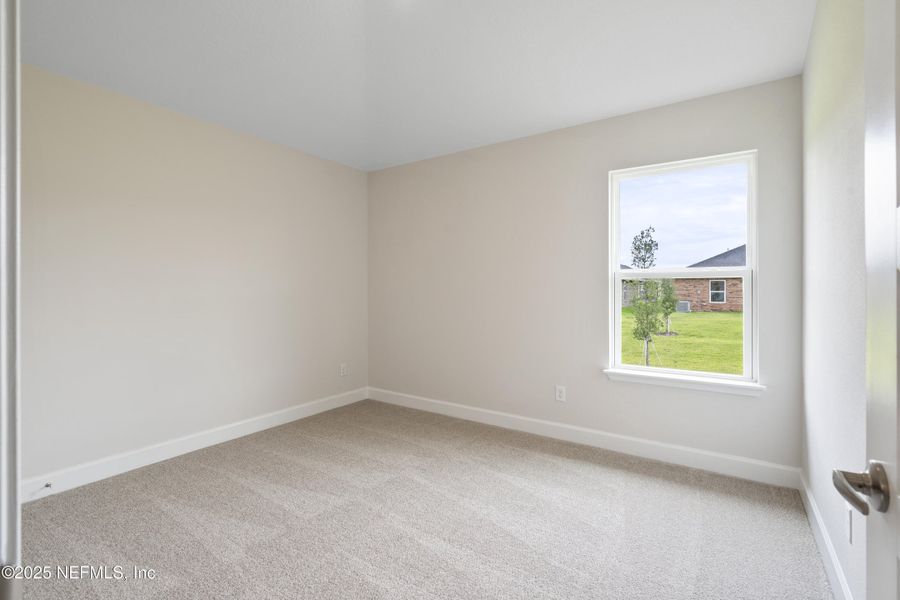Spacious, unfurnished interior of a new home in Shadow Crest at Rolling Hills, Green Cove Springs (Image 11).
