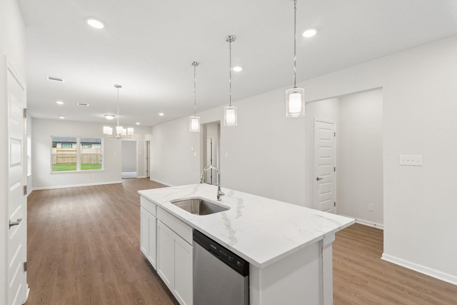 The Oakshire II- Kitchen into Dining Area. Sample image for illustration; upgrades, options, and colors may vary. The Oakshire II- Kitchen into Dining Area. Sample image for illustration; upgrades, options, and colors may vary.
