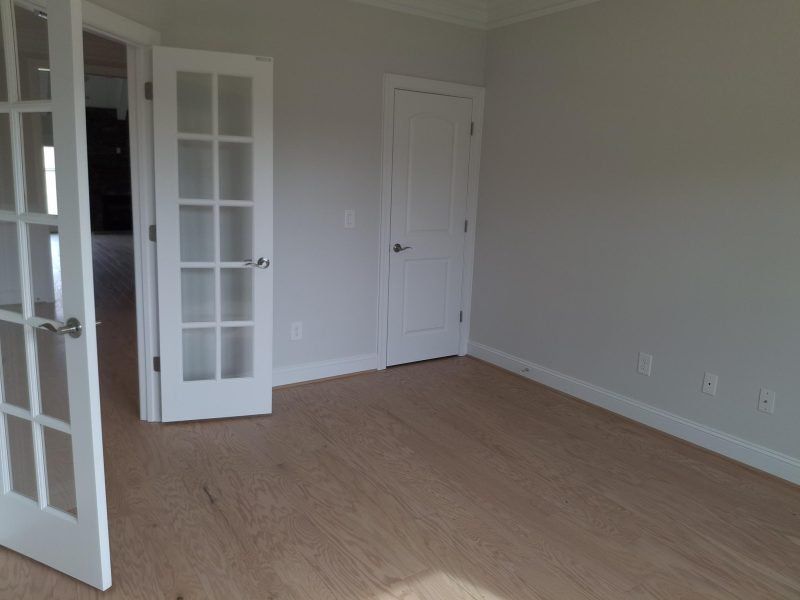 Spacious, unfurnished interior of a new home in Weybridge, Burlington (Image 34).