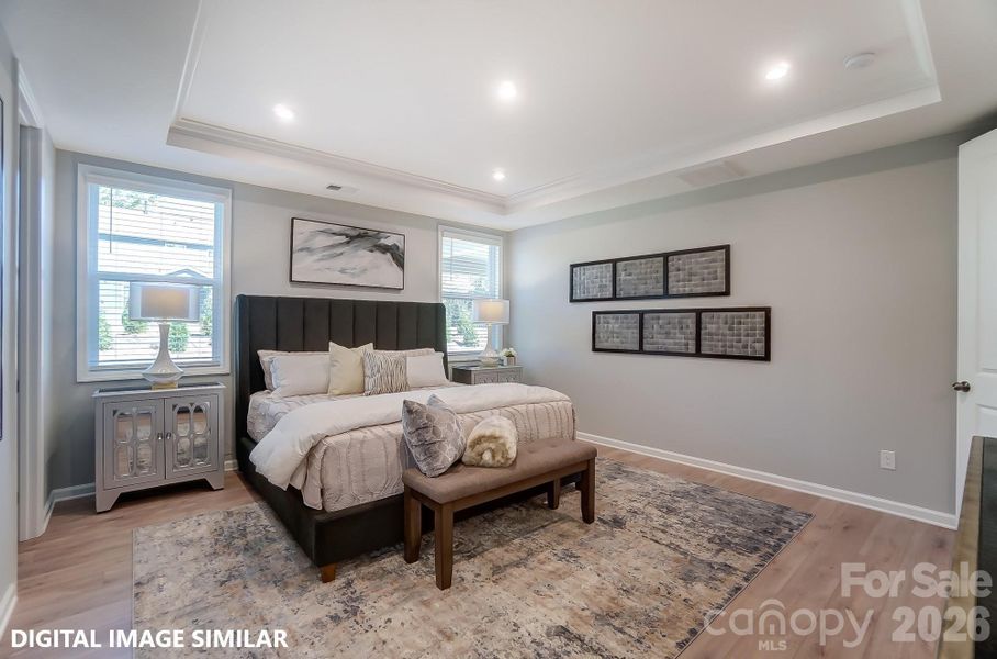 PRIMARY BEDROOM (MAIN LEVEL) - Photo is for representation purposes of floorplan only - colors, finishes, and options will vary