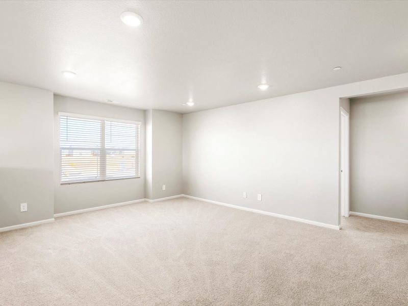 Spacious, unfurnished interior of a new home in Buffalo Highlands: The Flora Collection, Commerce City (Image 13).
