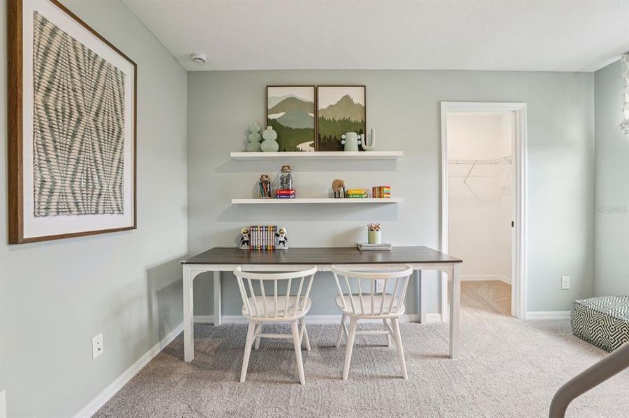 Furnished interior view inside a new home in Hawks Run, Kissimmee (Image 49).