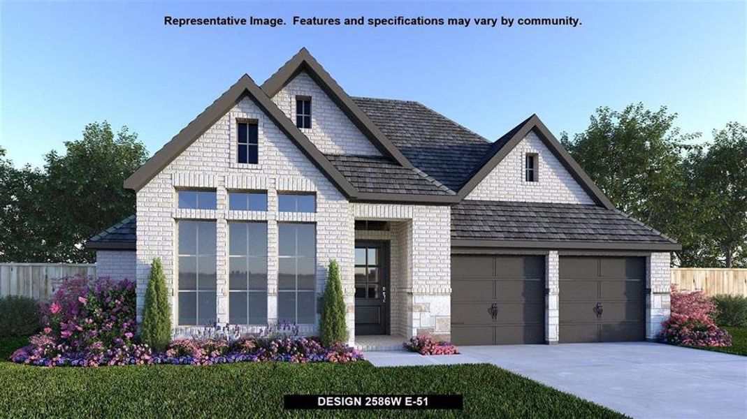 View of front of home featuring a garage