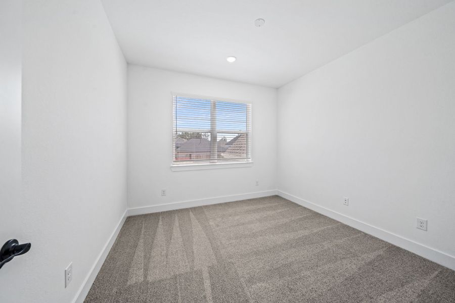 Representative unfurnished interior of a home built from the Waterloo – 60′ Lot by Chesmar Homes in Lakes of Cane Island, Katy (Image 24).