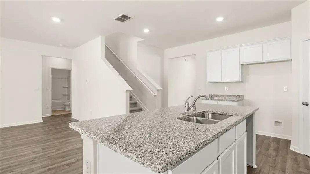 Furnished interior view inside a new home in Champion's Run, Lithonia (Image 7).