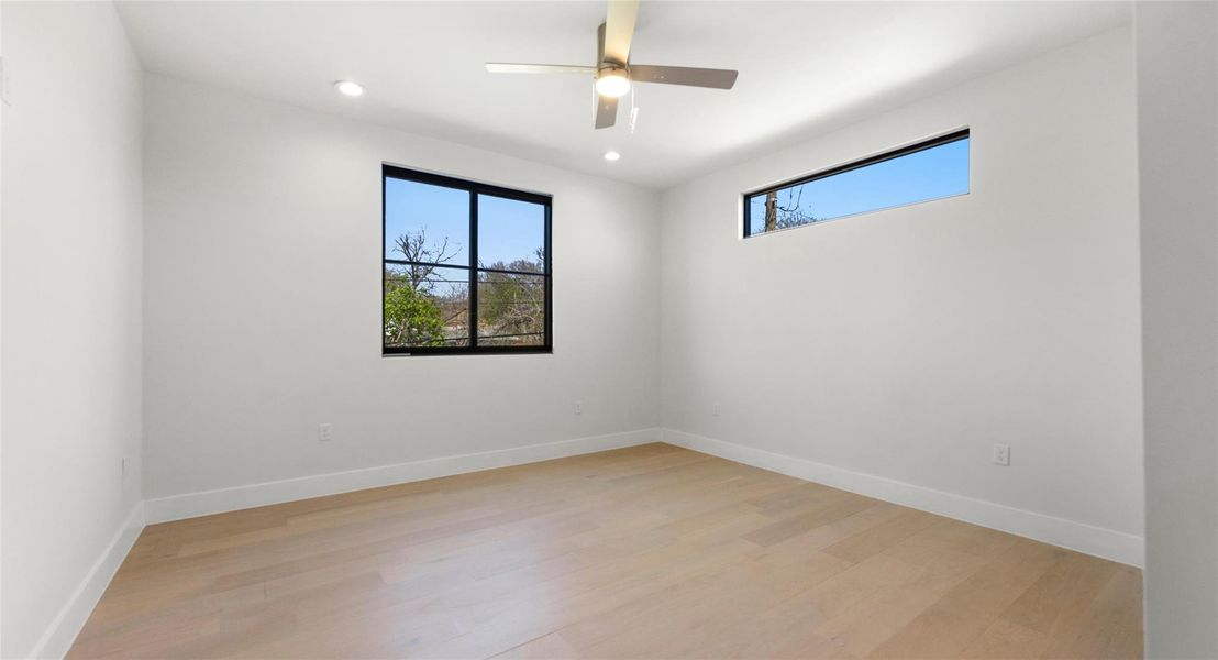 Unfurnished room featuring light wood-style flooring, recessed lighting, and ceiling fan